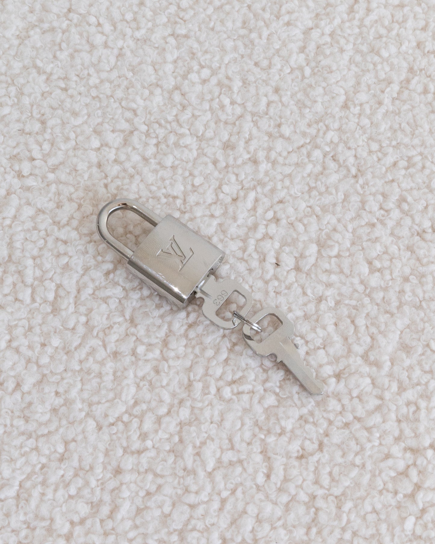 LOUIS VUITTON Lock