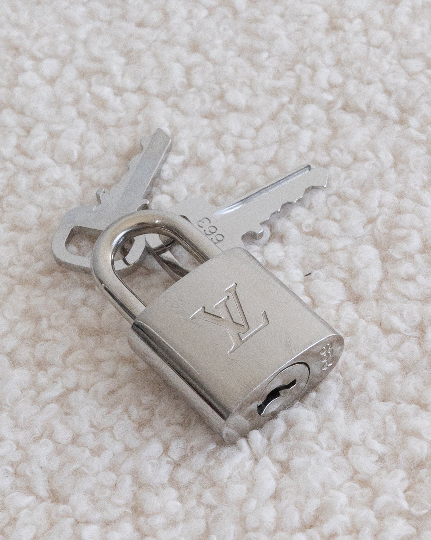 LOUIS VUITTON Lock